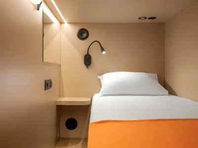 Вид на кровать нижней капсулы Комфорт — GettSleep Терминал B вылет